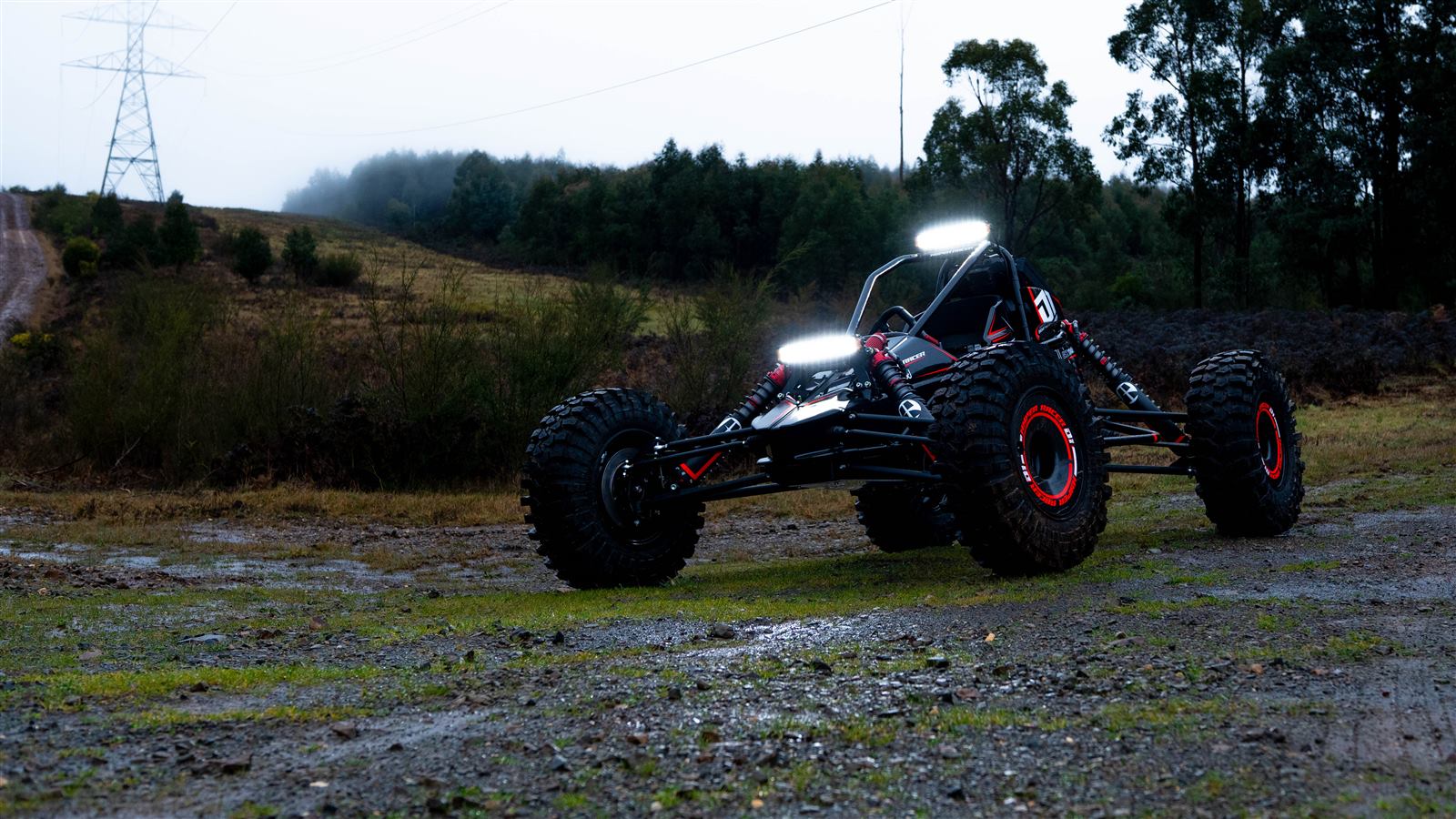 The Hyper Racer D1 with light bars on at dusk