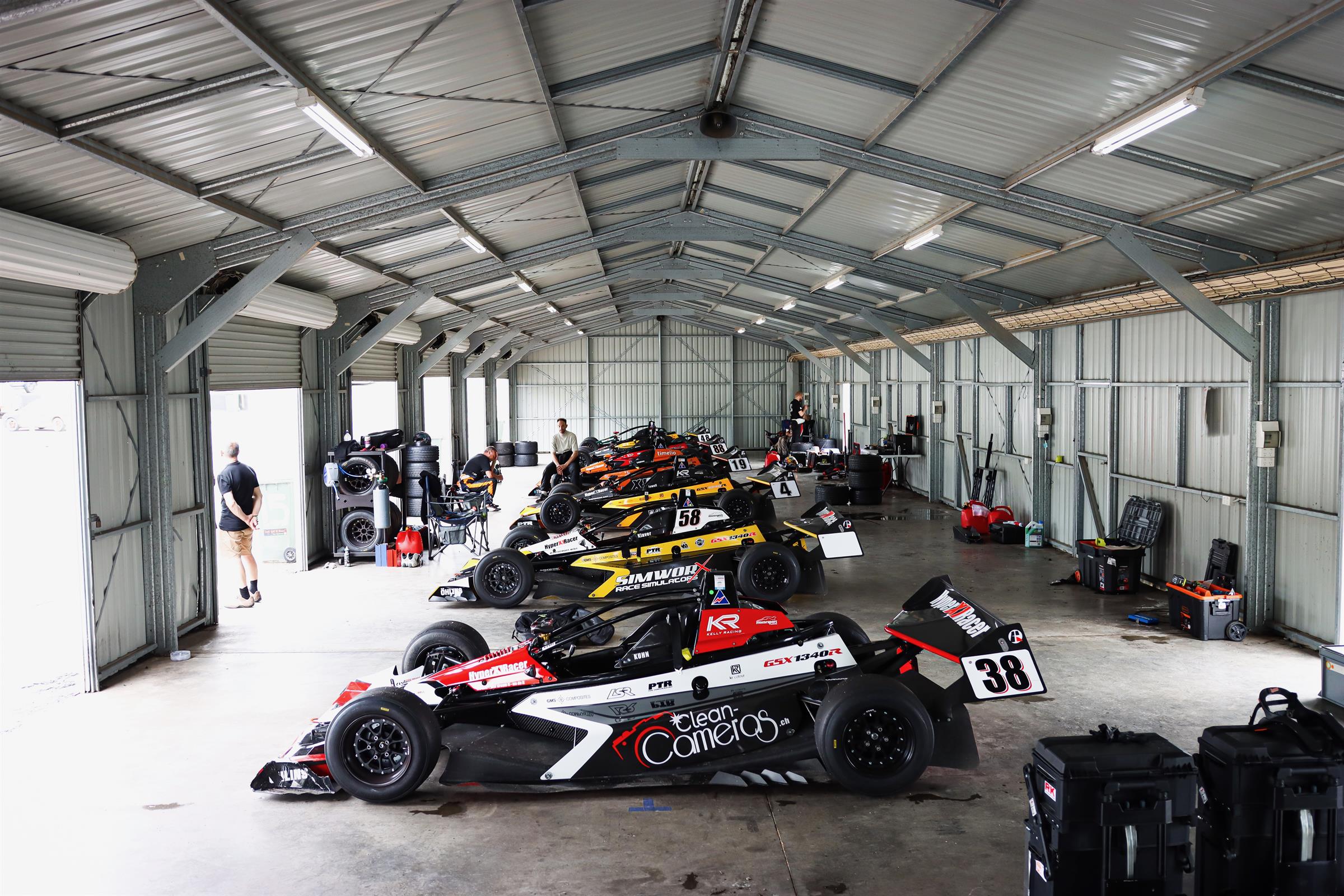 Hyper Racer X1s lined up in the garage